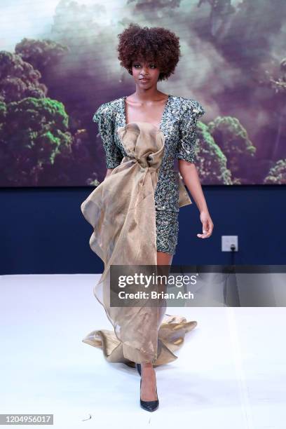 Model walks the runway wearing MM Milano Couture during NYFW Powered By hiTechMODA on February 08, 2020 in New York City.