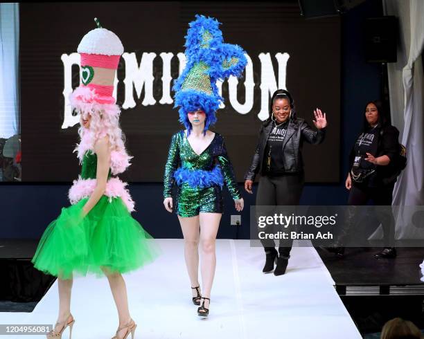 The designers walk the runway wearing Dominion Couture Costume Design during NYFW Powered By hiTechMODA on February 08, 2020 in New York City.