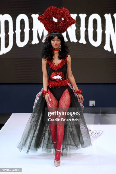 Model walks the runway wearing Dominion Couture Costume Design during NYFW Powered By hiTechMODA on February 08, 2020 in New York City.