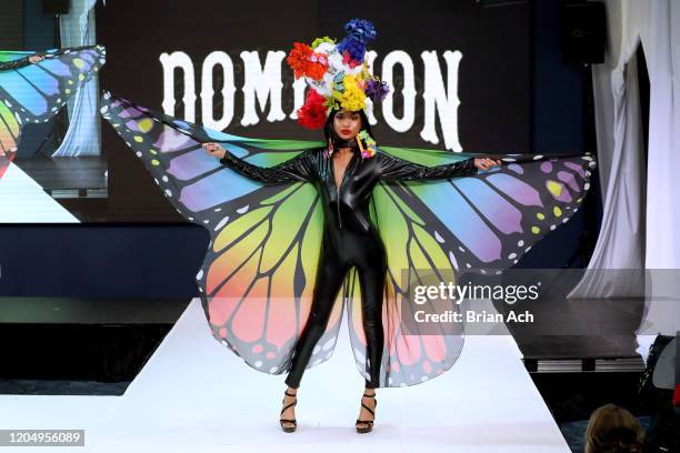 Model walks the runway wearing Dominion Couture Costume Design during NYFW Powered By hiTechMODA on February 08, 2020 in New York City.