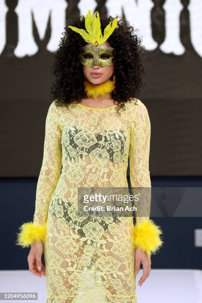 Model walks the runway wearing Dominion Couture Costume Design during NYFW Powered By hiTechMODA on February 08, 2020 in New York City.