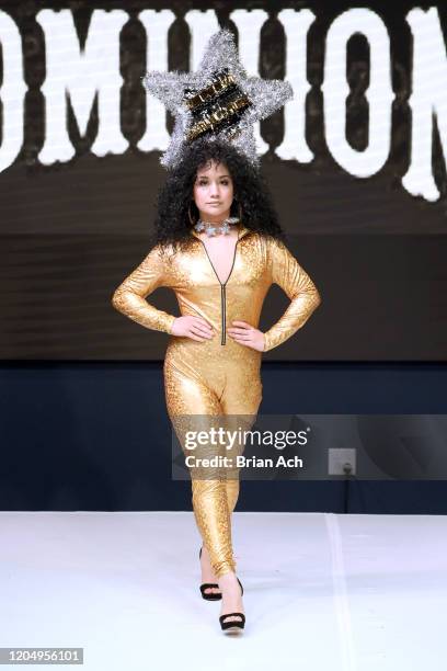 Model walks the runway wearing Dominion Couture Costume Design during NYFW Powered By hiTechMODA on February 08, 2020 in New York City.