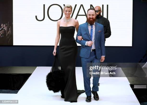 Model Lou Schieffelin walks the runway wearing Bebe's and Liz's presents JOVANI, with Celebrity Jeweler Mike Nekta New York during NYFW Powered By...