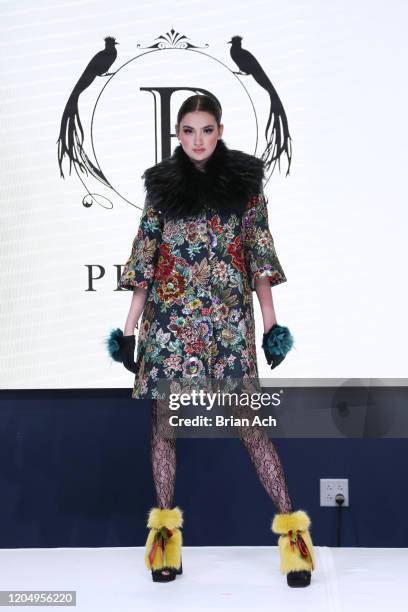 Model walks the runway wearing Pelush Luxury Faux Furs during NYFW Powered By hiTechMODA on February 08, 2020 in New York City.