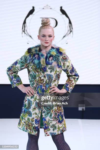 Model walks the runway wearing Pelush Luxury Faux Furs during NYFW Powered By hiTechMODA on February 08, 2020 in New York City.