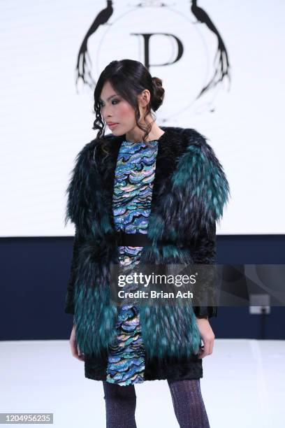 Model walks the runway wearing Pelush Luxury Faux Furs during NYFW Powered By hiTechMODA on February 08, 2020 in New York City.