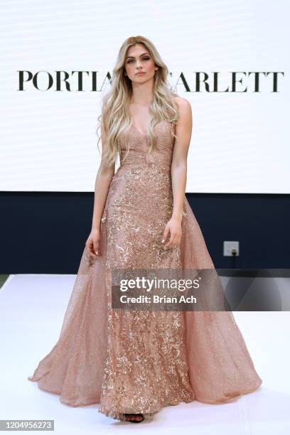 Model walks the runway wearing Portia & Scarlett Couture during NYFW Powered By hiTechMODA on February 08, 2020 in New York City.