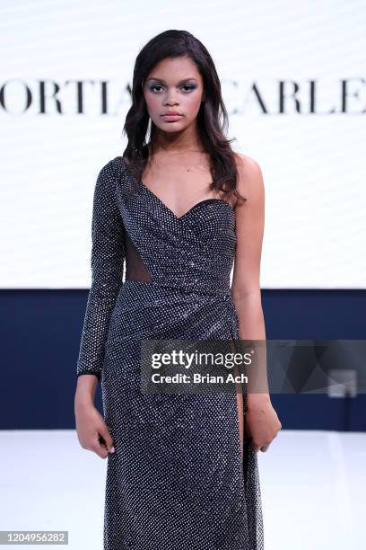 Model walks the runway wearing Portia & Scarlett Couture during NYFW Powered By hiTechMODA on February 08, 2020 in New York City.