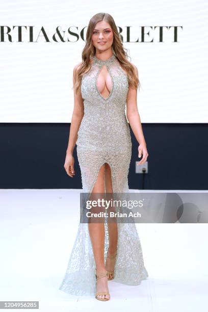 Model walks the runway wearing Portia & Scarlett Couture during NYFW Powered By hiTechMODA on February 08, 2020 in New York City.