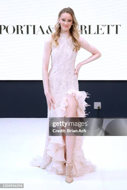 Model walks the runway wearing Portia & Scarlett Couture during NYFW Powered By hiTechMODA on February 08, 2020 in New York City.