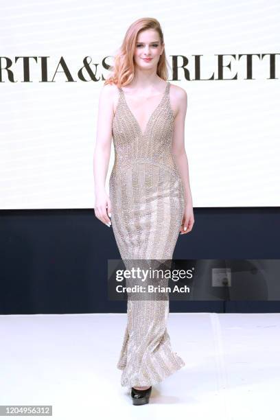 Model walks the runway wearing Portia & Scarlett Couture during NYFW Powered By hiTechMODA on February 08, 2020 in New York City.