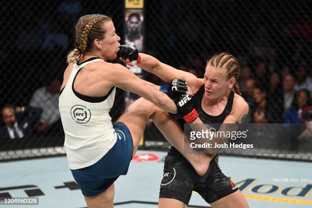 Valentina Shevchenko of Kyrgyzstan punches Katlyn Chookagian in their women's flyweight championship bout during the UFC 247 event at Toyota Center...