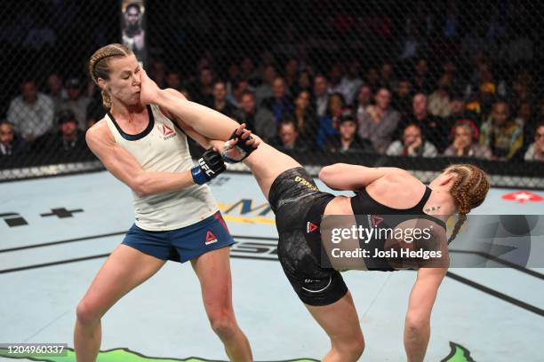 Valentina Shevchenko of Kyrgyzstan kicks Katlyn Chookagian in their women's flyweight championship bout during the UFC 247 event at Toyota Center on...