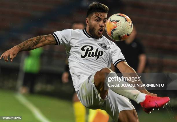 Paraguay's Libertad forward Hector Villalba controls the ball during their Copa Libertadores football match at Atanasio Girardot Stadium in Medellin,...