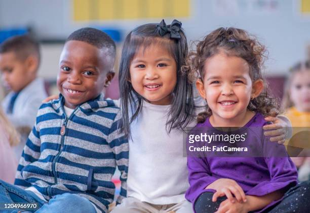 daycare children portrait stock photo - preschool stock pictures, royalty-free photos & images
