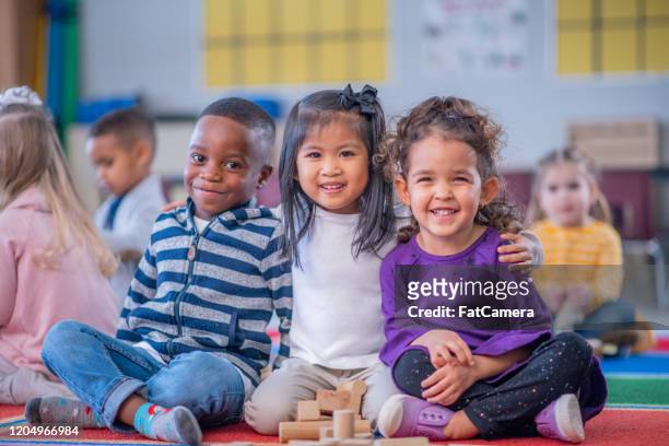 daycare children portrait stock photo - preschool stock pictures, royalty-free photos & images