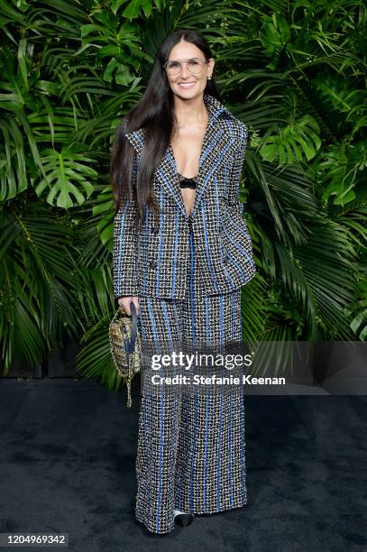 Demi Moore, wearing CHANEL, attends CHANEL and Charles Finch Pre-Oscar Awards Dinner at Polo Lounge at The Beverly Hills Hotel on February 08, 2020...