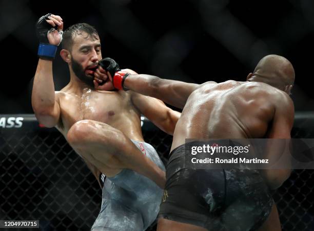 Dominick Reyes and Jon Jones in their UFC Light Heavyweight Championship bout during UFC 247 at Toyota Center on February 08, 2020 in Houston, Texas.