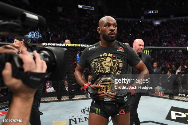 Jon Jones celebrates his victory over Dominick Reyes in their light heavyweight championship bout during the UFC 247 event at Toyota Center on...