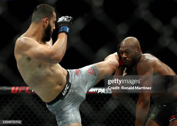 Dominick Reyes and Jon Jones in their UFC Light Heavyweight Championship bout during UFC 247 at Toyota Center on February 08, 2020 in Houston, Texas.