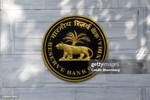 The Reserve Bank of India logo is displayed outside the central bank in Mumbai, India, on Tuesday, March 3, 2020. RBI Governor Shaktikanta Das said...