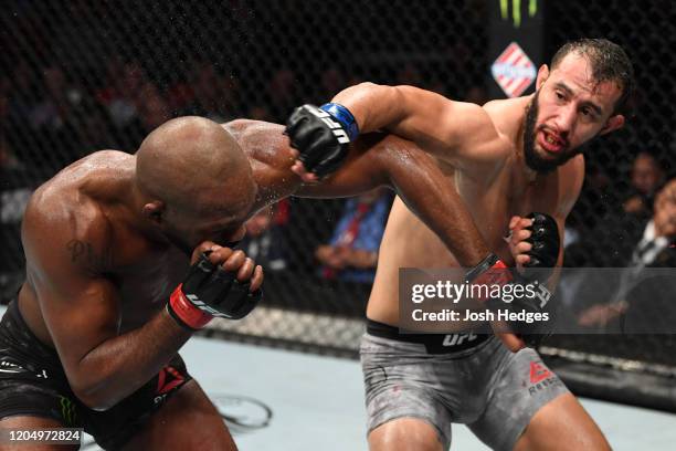 Dominick Reyes punches Jon Jones in their light heavyweight championship bout during the UFC 247 event at Toyota Center on February 08, 2020 in...
