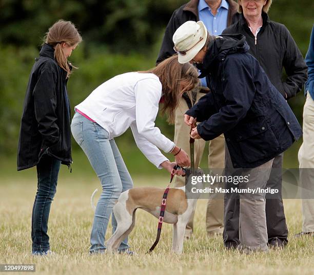 Princess Anne, The Princess Royal uses her trouser belt as a makeshift dog lead as she attends day 2 of The Festival of British Eventing at Gatcombe...