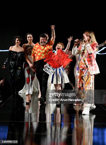 Designer Domingo Zapata and Madeline Stuart walk the runway during Domingo Zapata At New York Fashion Week Powered By Art Hearts Fashion NYFW 2020 at...