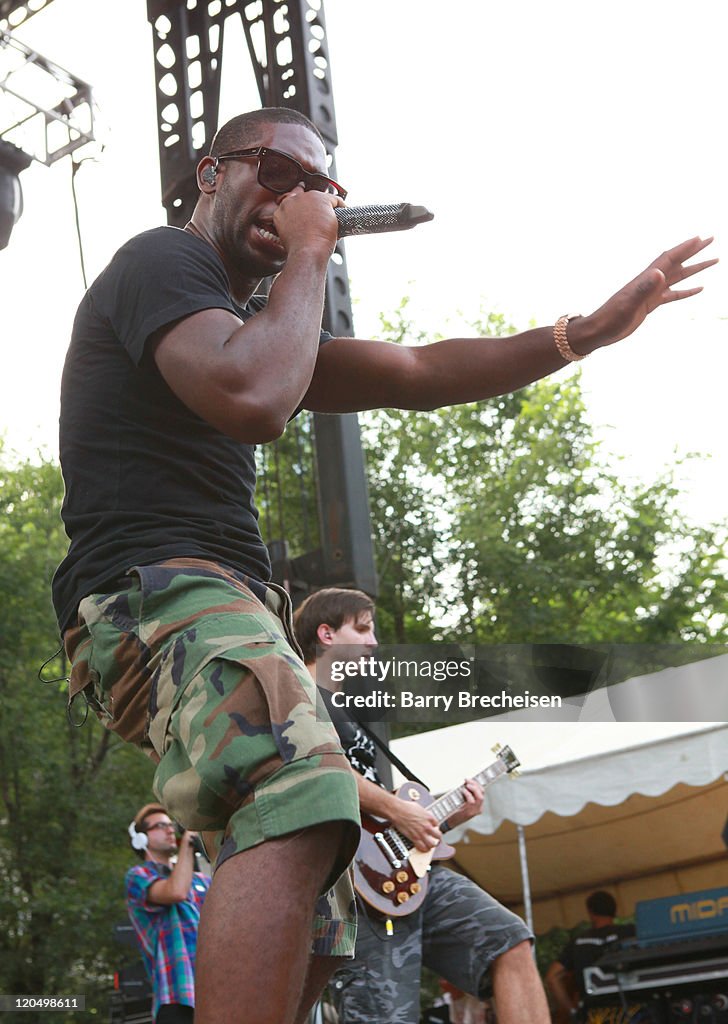 Tinie Rapper Rapper Tinie Tempah performs during 2011 Lollapalooza at Grant Park ...
