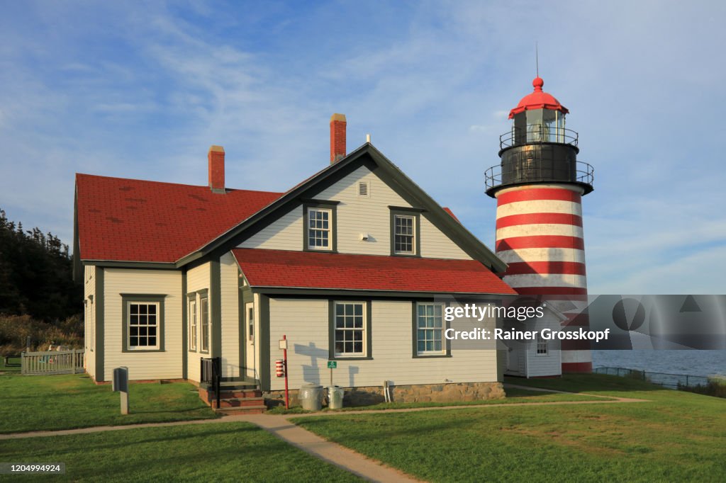 The red-and-white striped West Quoddy Head Lighthouse in Maine