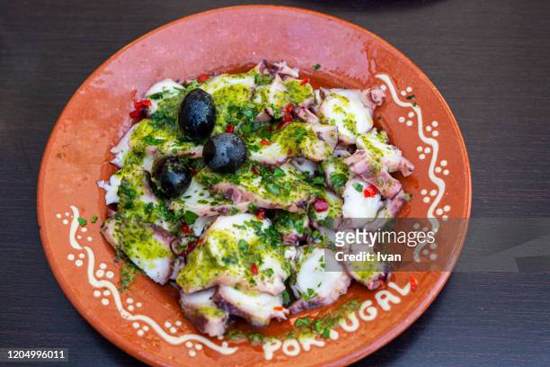 traditional portugal cuisine, octopus salad - alentejo stockfoto's en -beelden