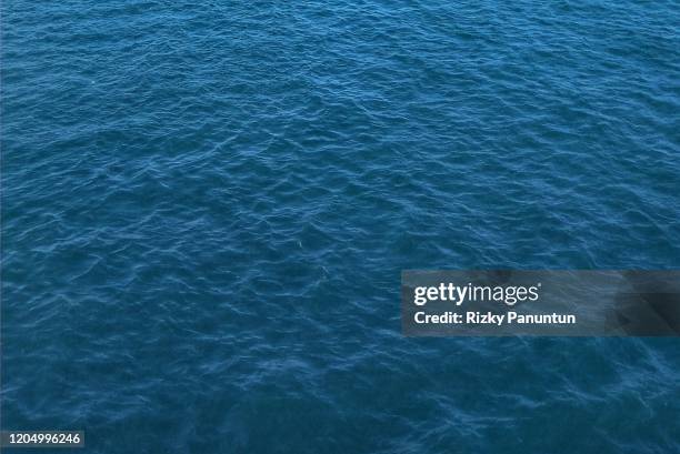 aerial view of surface of sea - blue water ripple overhead stock pictures, royalty-free photos & images