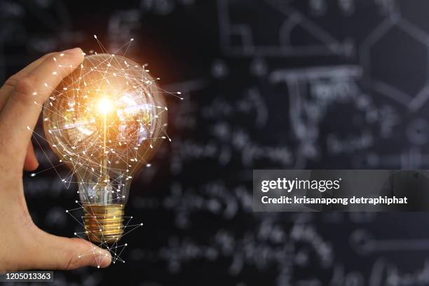 light bulbs concept,ideas of new ideas with innovative technology and creativity. - ideas generation foto e immagini stock