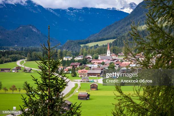 elmen in the lech valley is surrounded by the lovely nature park tiroler lech - lech austria stock pictures, royalty-free photos & images