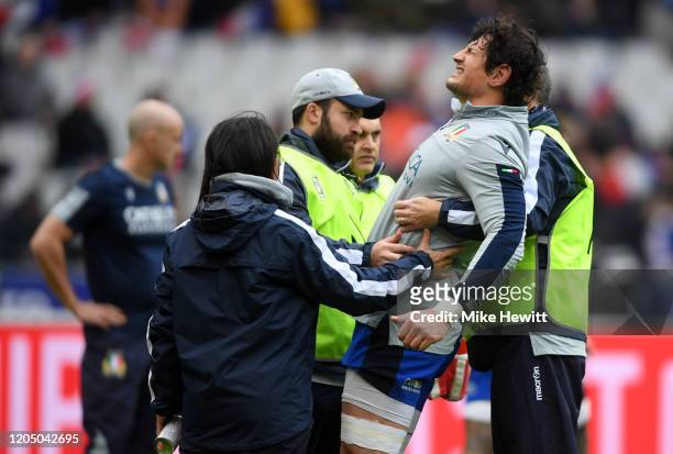 Alessandro Zanni of Italy receives treatment after picking up an injury in warm up prior to the 2020 Guinness Six Nations match between France and...