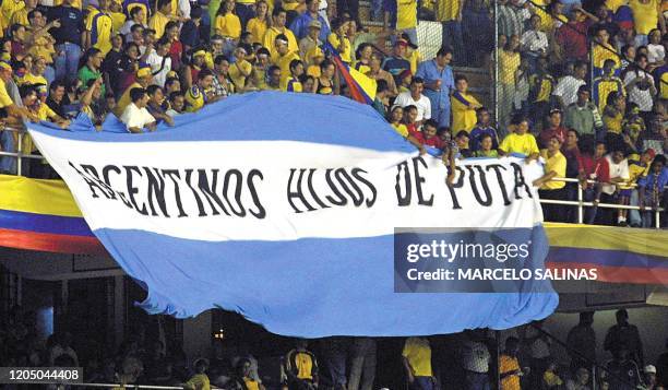 Colombian fans unfurl a banner emblazoned with an anti-Argentinian epithet in response to Argentinian refusal to particiapte in the Copa America, 11...