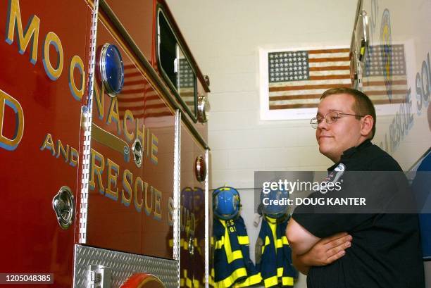 2Emergency Medical Technician Joe Civinski poses at the Moonachie First Aid & Rescue Squad in New Jersey 26 August 2002. Civinski was working and...