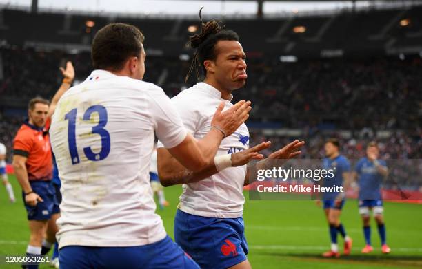 Teddy Thomas of France celebrates scoring his sides first try with Virimi Vakatawa during the 2020 Guinness Six Nations match between France and...