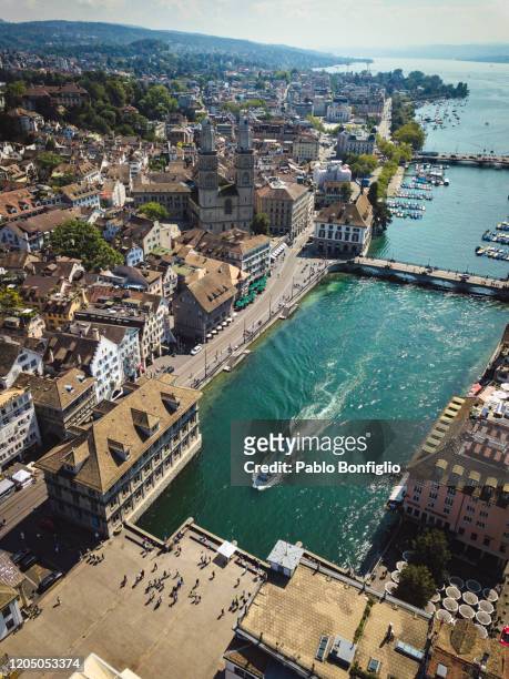 aerial view of grossmünster cathedral in zürich, switzerland - zurich stock pictures, royalty-free photos & images