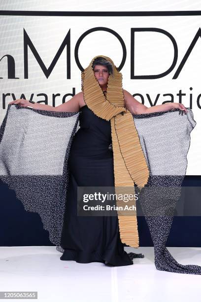 Model walks the runway wearing Art Elio Fashion Designer during NYFW Powered By hiTechMODA on February 08, 2020 in New York City.