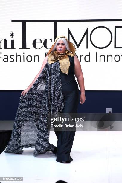 Model walks the runway wearing Art Elio Fashion Designer during NYFW Powered By hiTechMODA on February 08, 2020 in New York City.