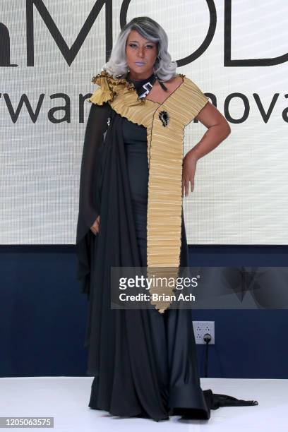 Model walks the runway wearing Art Elio Fashion Designer during NYFW Powered By hiTechMODA on February 08, 2020 in New York City.