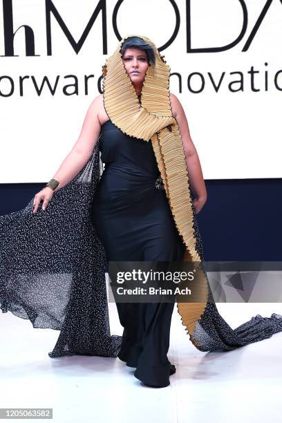 Model walks the runway wearing Art Elio Fashion Designer during NYFW Powered By hiTechMODA on February 08, 2020 in New York City.