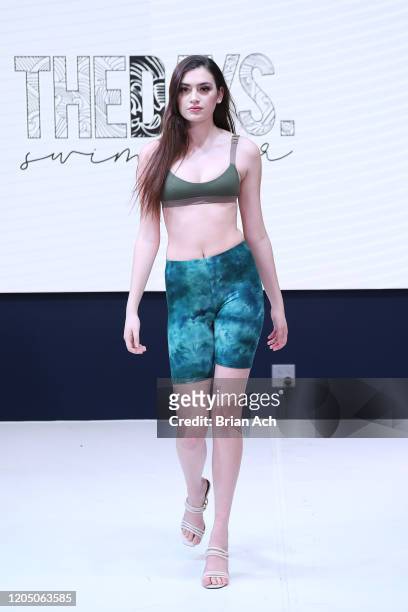 Model walks the runway wearing The Days Swimwear during NYFW Powered By hiTechMODA on February 08, 2020 in New York City.