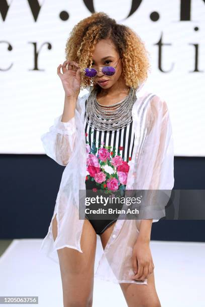 Model walks the runway wearing WOKE Creations during NYFW Powered By hiTechMODA on February 08, 2020 in New York City.