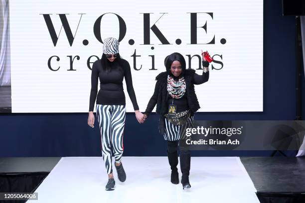 Designers walk the runway wearing WOKE Creations during NYFW Powered By hiTechMODA on February 08, 2020 in New York City.