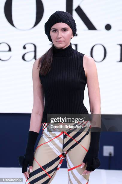 Model walks the runway wearing WOKE Creations during NYFW Powered By hiTechMODA on February 08, 2020 in New York City.