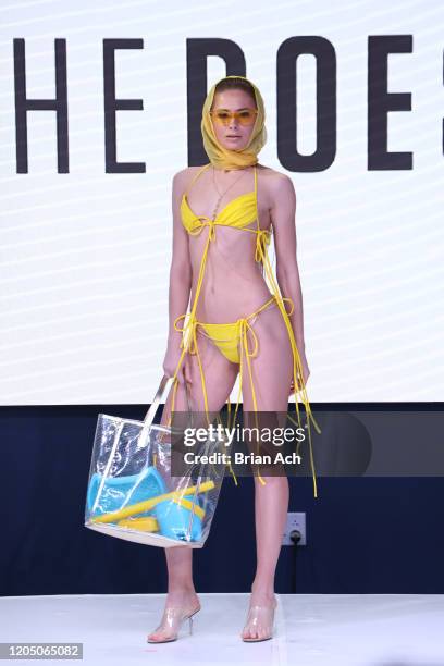 Model walks the runway wearing She Does Official during NYFW Powered By hiTechMODA on February 08, 2020 in New York City.