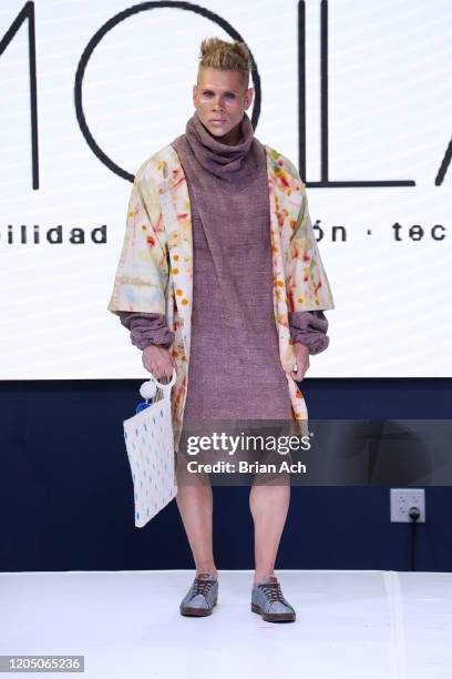 Model walks the runway wearing TARPUI during NYFW Powered By hiTechMODA on February 08, 2020 in New York City.