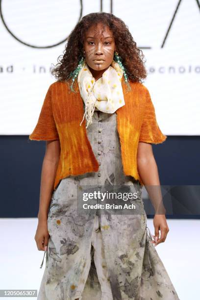 Model walks the runway wearing TARPUI during NYFW Powered By hiTechMODA on February 08, 2020 in New York City.